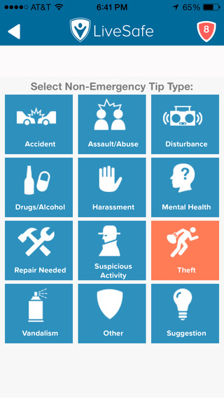 Schermafbeelding van de LiveSafe-app met de keuze “Select Non-Emergency Tip Type”, met tegels zoals Accident, Assault/Abuse, Drugs/Alcohol, Harassment, Suspicious Activity, Theft en Vandalism.